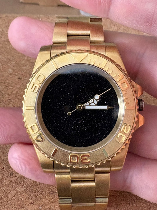 black starry night dial in 40mm gold sub case